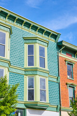 Bay windows on teal brick building in Public Square Mount Vernon Ohio
