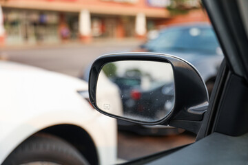 Car mirror reflects life's journey, symbolizing reflection, hindsight, self-awareness, and the road...