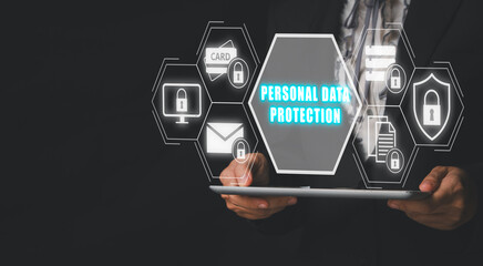 Personal data protection concept, Businesswoman hand holding tablet with personal data protection icon on virtual screen.