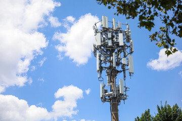 Telecommunication tower's radio antenna symbolizes global communication, progress, wireless networks, and technological advancement - obrazy, fototapety, plakaty
