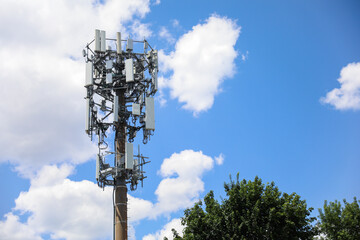 Telecommunication tower's radio antenna symbolizes global communication, progress, wireless networks, and technological advancement