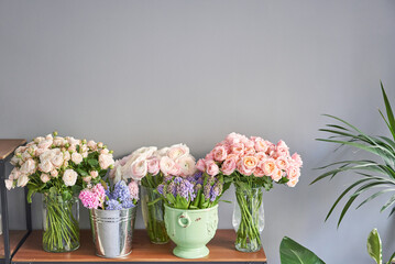 Many different flowers on Showcase. Background of mix of flowers. Beautiful flowers for catalog or online store. Floral shop and delivery concept.