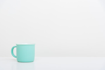 Realistic Mild green cup isolated on white background