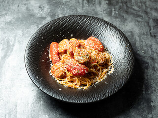 spaghetti with tomato sauce and meatballs