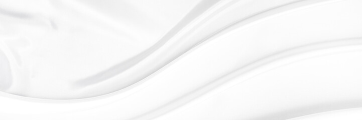 White gray satin texture that is white silver fabric silk panorama background with beautiful soft...