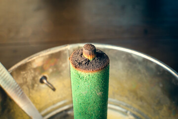 Outdoor mosquito repellent. Insecticide sticks from midges of green color, close-up