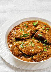 Cube Steak with Brown Balsamic Onion Gravy in bowl