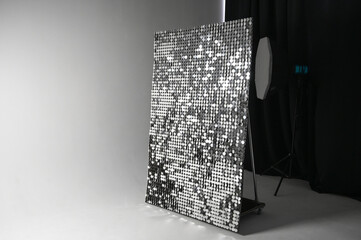 Studio with cyclorama. Interior of modern photostudio with glitter backdrop for photography,...