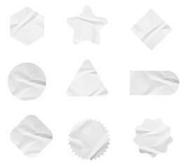 Set of white paper crumpled sticky notes tags and labels isolated on white background.