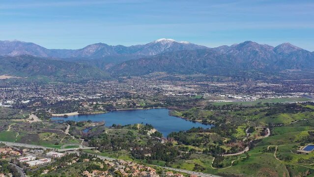 Aerial view of the Puddingstone Reservoir with Los Angeles area cityscape