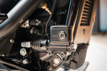 Obraz na płótnie Canvas Rear Brake Pump Assembly Foot Brake Master Cylinder ,hydraulic system for disc brakes on motorcycle