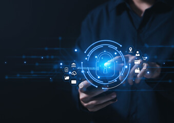 Businessman touching padlock icon on virtual display internet network cyber security concept	
