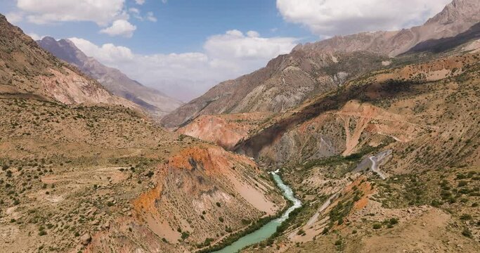 Iskanderkul Lake And Scenic Mountains In Tajikistan - aerial drone shot