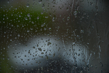 the glass is splashed with raindrops
