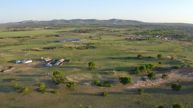 Static aerial of nomadic ranch farmers on xilinguole grasslands Mongolia, panoramic overview