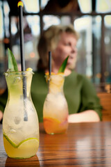 person drinking cocktail