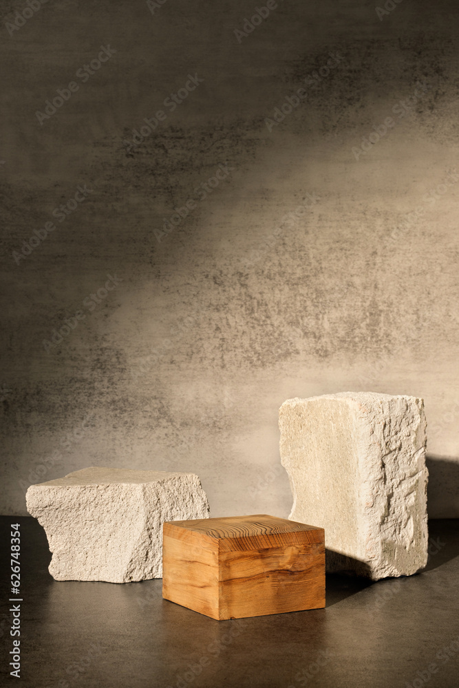 Poster rough stone and wooden box with sunlight from window on concrete wall and floor background,copy spac