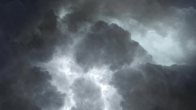 Storm Clouds With Lightning Strikes Reflecting.