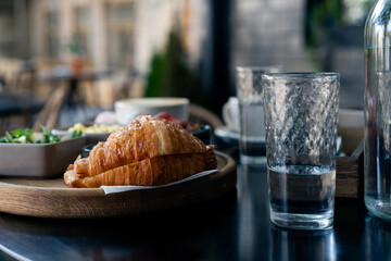 Breakfast with eggs and coffee and croissant. Morning breakfast