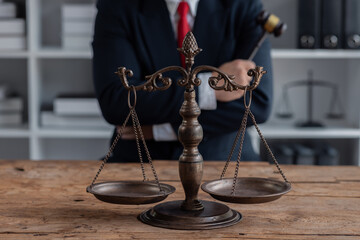 Male business man lawyers working with contract papers at the law firms. Judge gavel with scales of justice. Legal law, lawyer, documents, advice and attorney, court judge, concept.