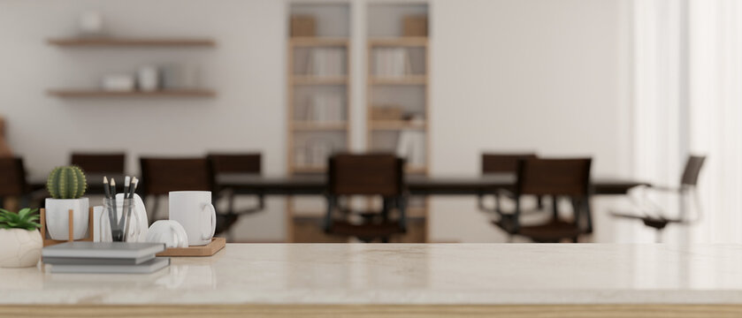 Empty space on a tabletop against blurred modern meeting asa background. workspace concept.
