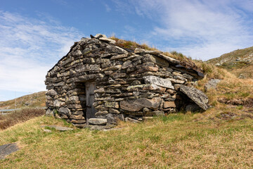 Stone shelter at the Sognefjellet mountain road in Norway. Sognefjellsvegen - The National Tourist Route. RV 55