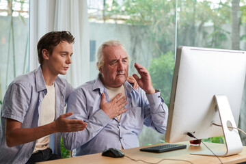 Teenager and grandfather video calling general practitioner to complain about severe headache