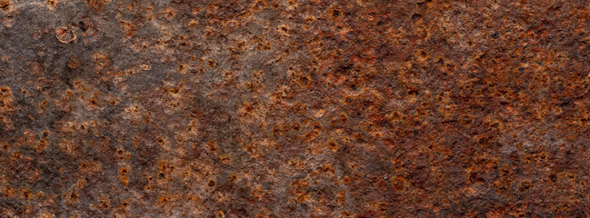 close up shot of an old dirty reddish brown rust metal plate surface texture for banner background