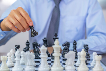 hand moves chess with strategy and tactic to win enemy, play battle on board game, business...