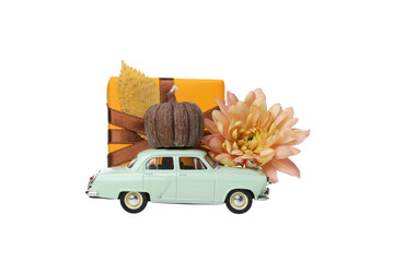 PNG, a toy car with a gift and a pumpkin on the roof, isolated on white background