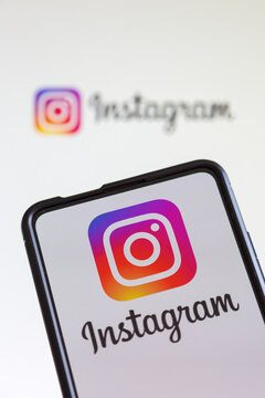 Instagram logo social media on a mobile phone and computer screen
