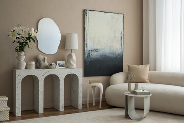 Aesthetic composition of elegant living room interior with mock up poster frame, boucle sofa, marble arch console, stylish mirror, vase with flowers and personal accessories. Home decor. Template.