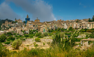 Naklejka premium The small village Valldemossa on the hill in the mountains of Mallorca