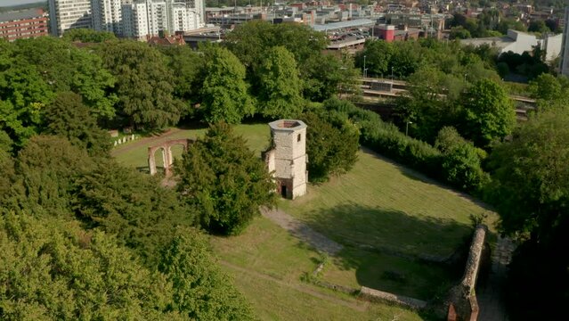 Descending aerial shot over derelict church building Basingstoke UK
