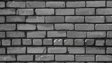 gray background, on the photo is a gray brick wall close-up