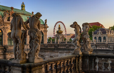 Fototapeta na wymiar Zwinger palace (Der Dresdner Zwinger) Art Gallery of Dresden. In the foreground are statues of bathers. Dresden, Saxony, Germany.
