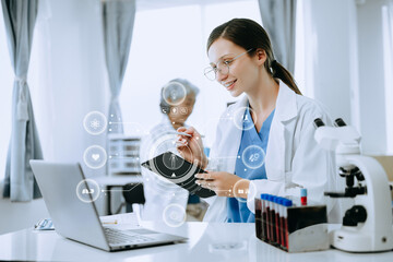 medical technology concept,smart woman doctor hand working with modern laptop computer with his team virtual icon diagram .