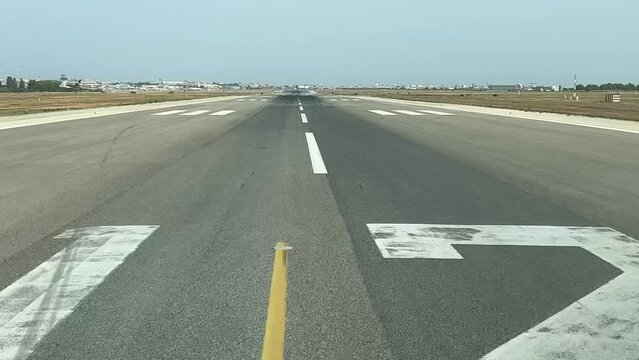 Take-off roll. Unique shot from a jet cabin during the initial phase of the take-off. Runway 12. Sunny summer day. Pilot&rsquo;s perspective.