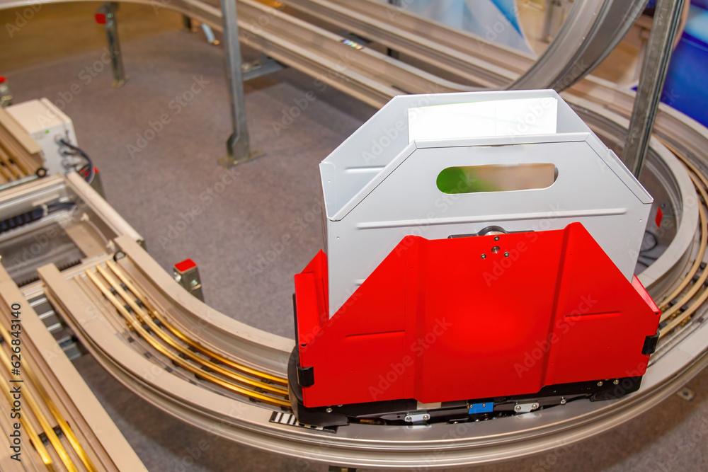 Poster narrow conveyor. automated line for supply of goods. conveyor inside book depository. production lin
