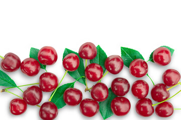 Ripe fresh cherry lies randomly with foliage isolated on transparent background.