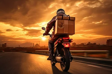 Tuinposter parcel delivery by motorbike in the evening © Aksana