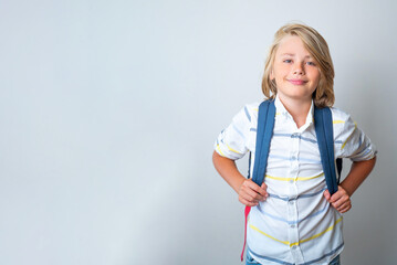 Middle school smiling teen boy girl backpack white background looking at camera. Copy space for advertising blank concept. Back to school. Childhood, education, products for children