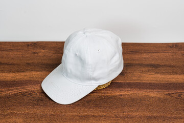The understated charm of a white blank hat shines in this captivating mockup image