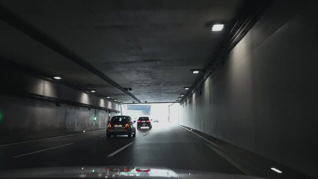 Pov drive on highway tunnel passage in Cologne, Germany