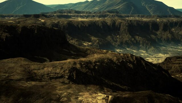 black volcanic basalt rock formations in the low light