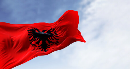Albanian national flag waving in the wind on a clear day