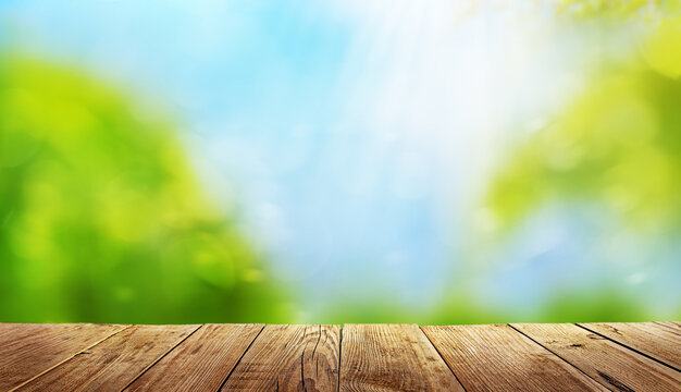 wooden table and blurred natural background