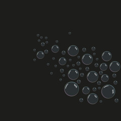 Image of many beautiful soap bubbles on a black background