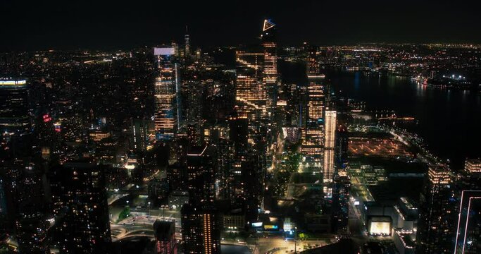 Aerial Helicopter View of Downtown Manhattan Architecture. Drone Footage of Skyscrapers and Office Buildings at Night. Evening Urban Landscape with Historic New York City