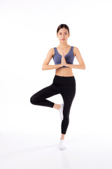Fototapeta na wymiar Portrait beautiful young asian woman in sportswear doing practice yoga for relax isolated white background, female exercise and workout training for leisure, sport and health care concept.